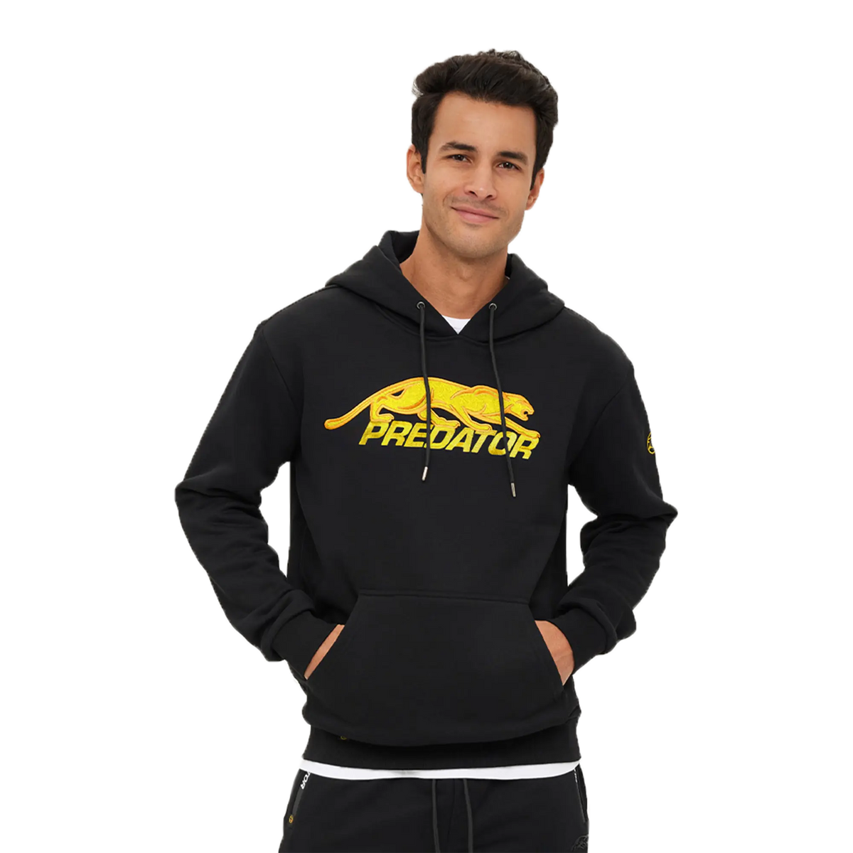 Man wearing Predator black hoodie with gold