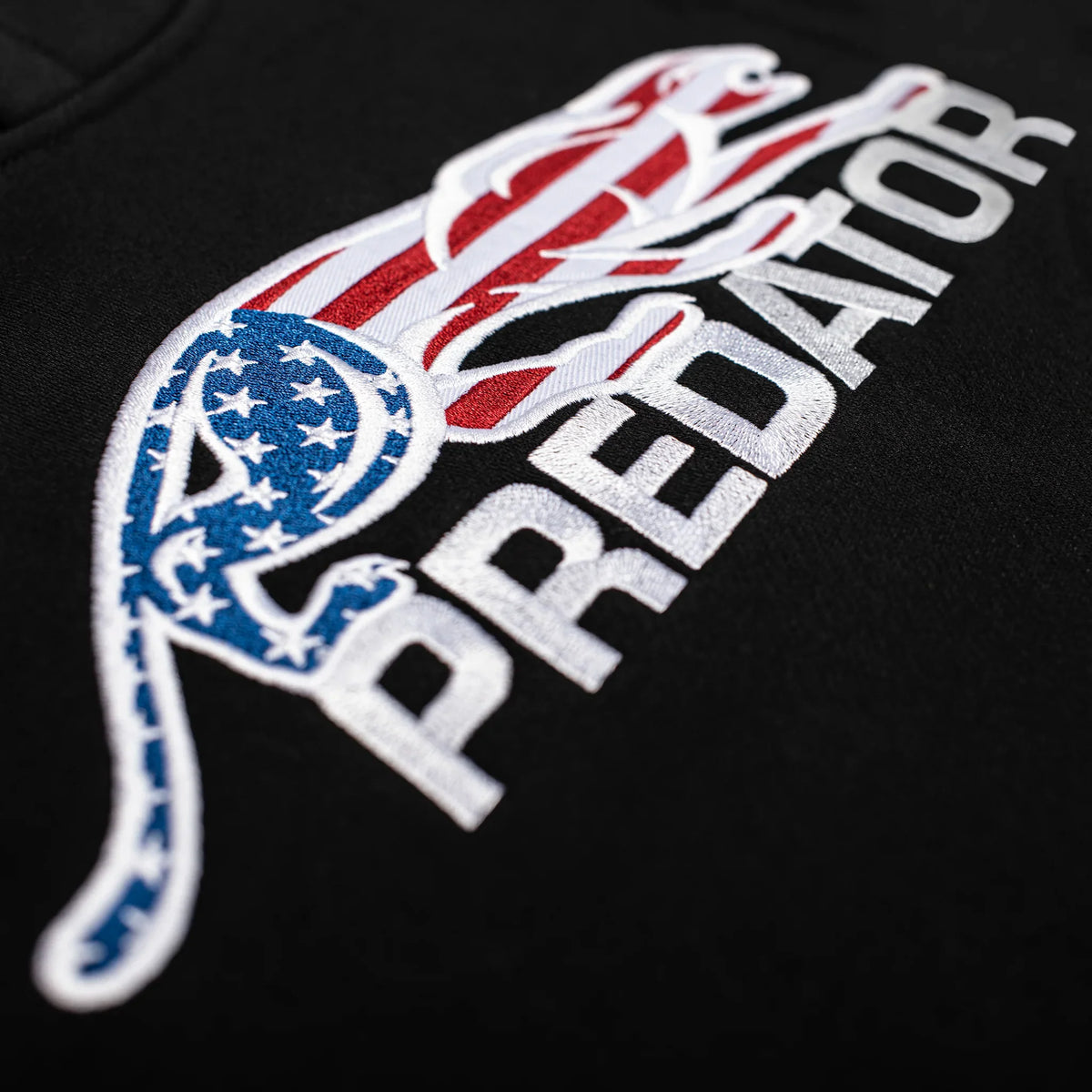 Embroidered Predator branding with American flag design