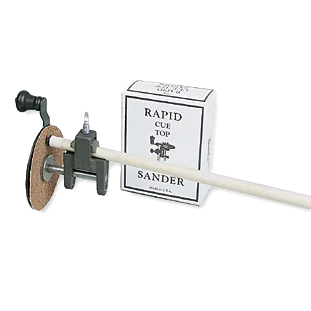 Rapid Cue Top Sander Mounted on a Cue Shaft Beside Its Box