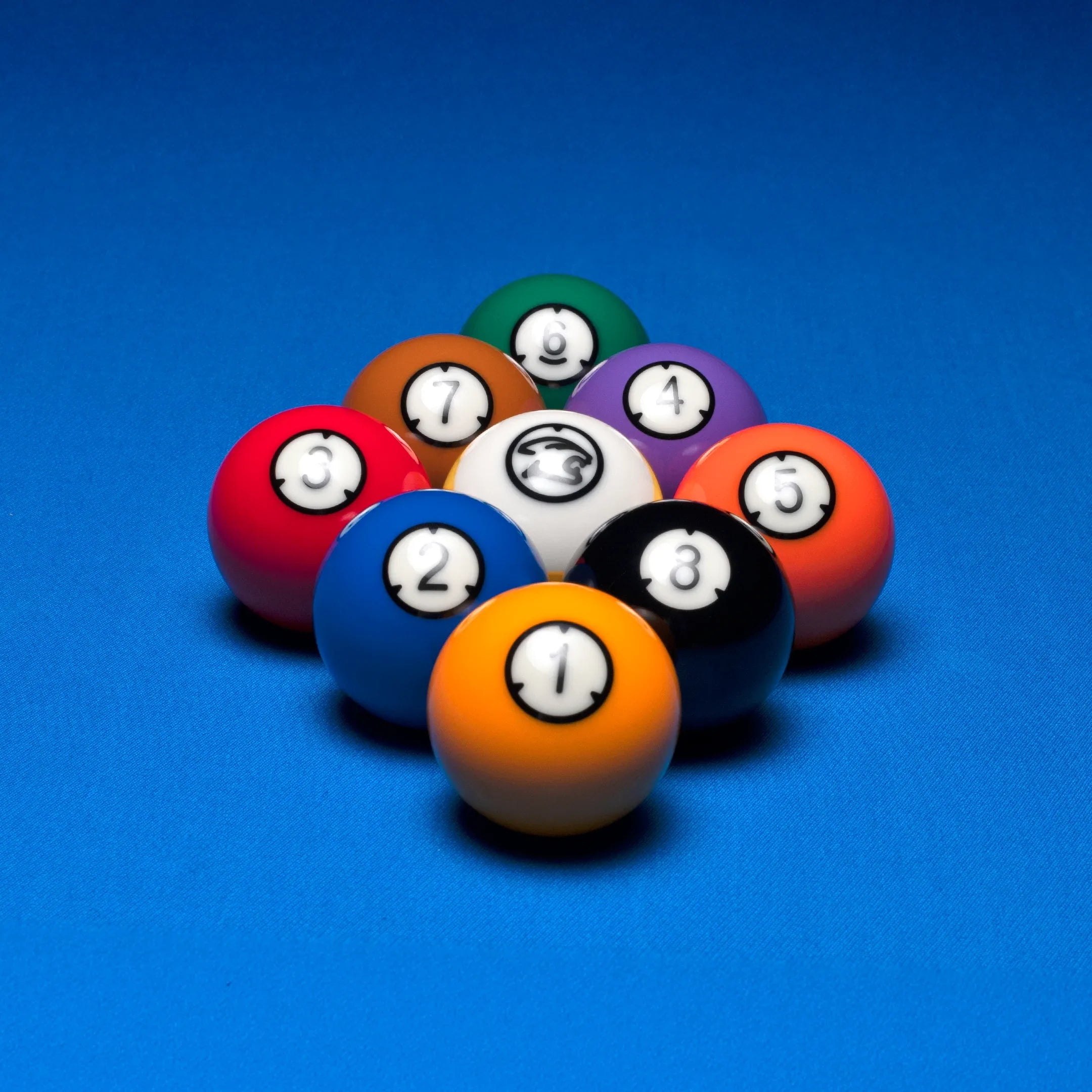 Arcos II Billiard Ball Set On A Pool Table